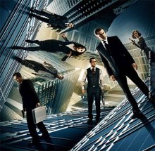Characters from Inception standing at gravitationally confusing angles to one another as in an Escher drawing